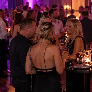 Friends meeting at an elegant evening event
